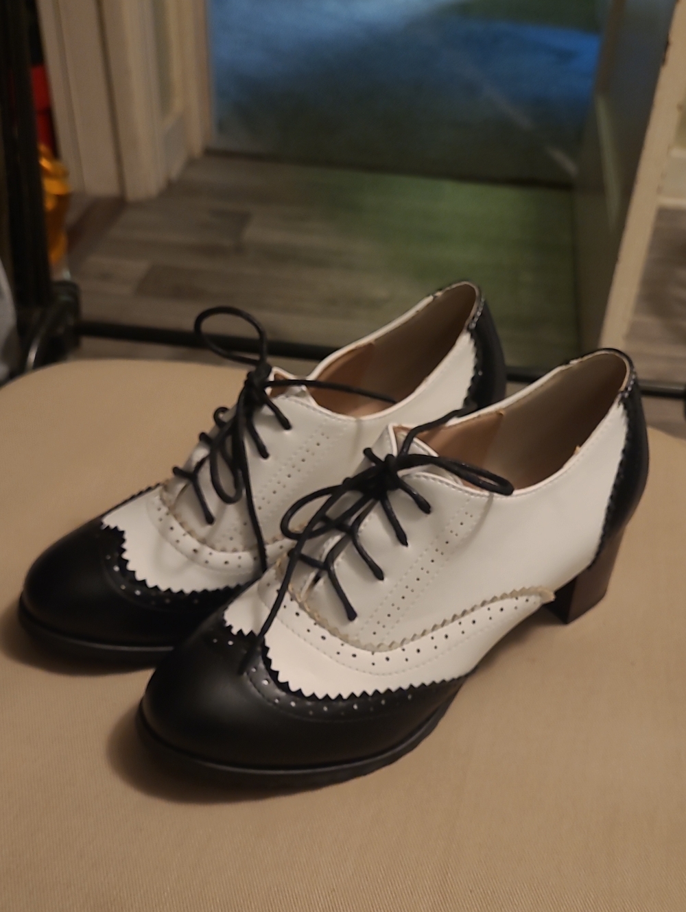 Women's Two-Tone Black and White Wingtip Lace-Up Flats
